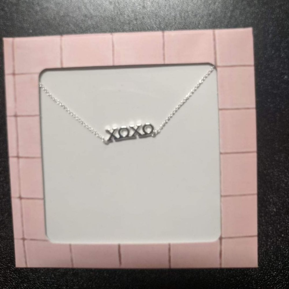 Stella and Dot xoxo necklace in package